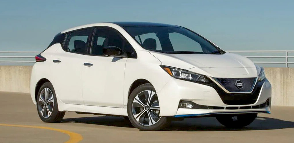 Side view of white Nissan Leaf