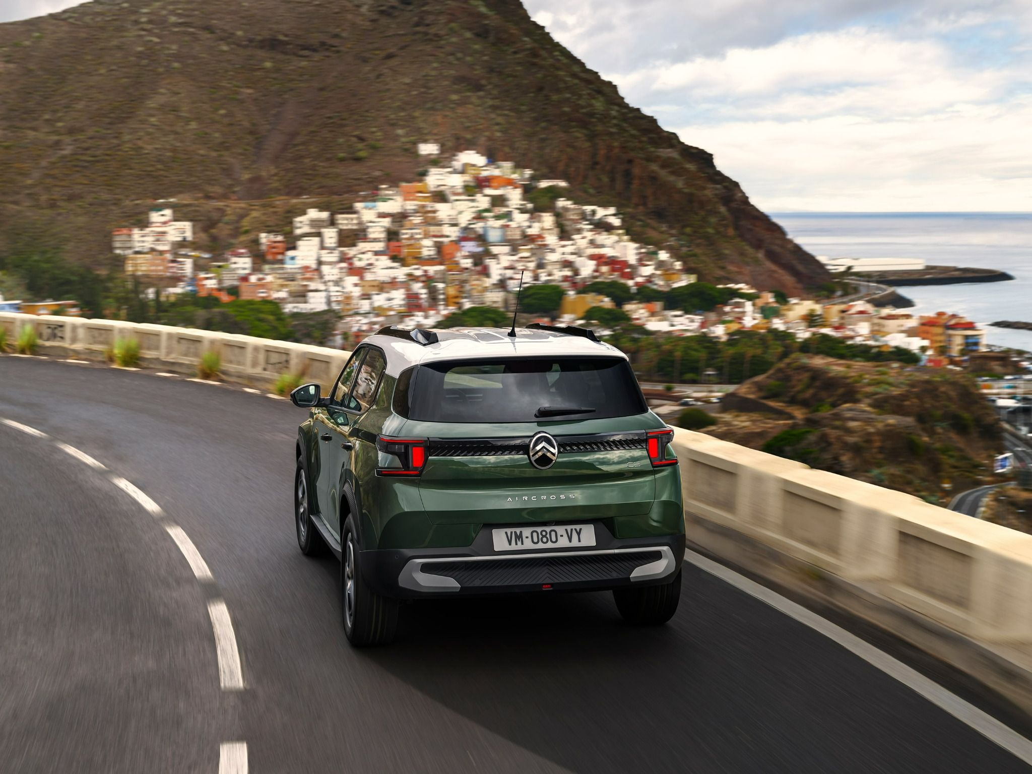 New Citroen C3 Aircross in green driving shot