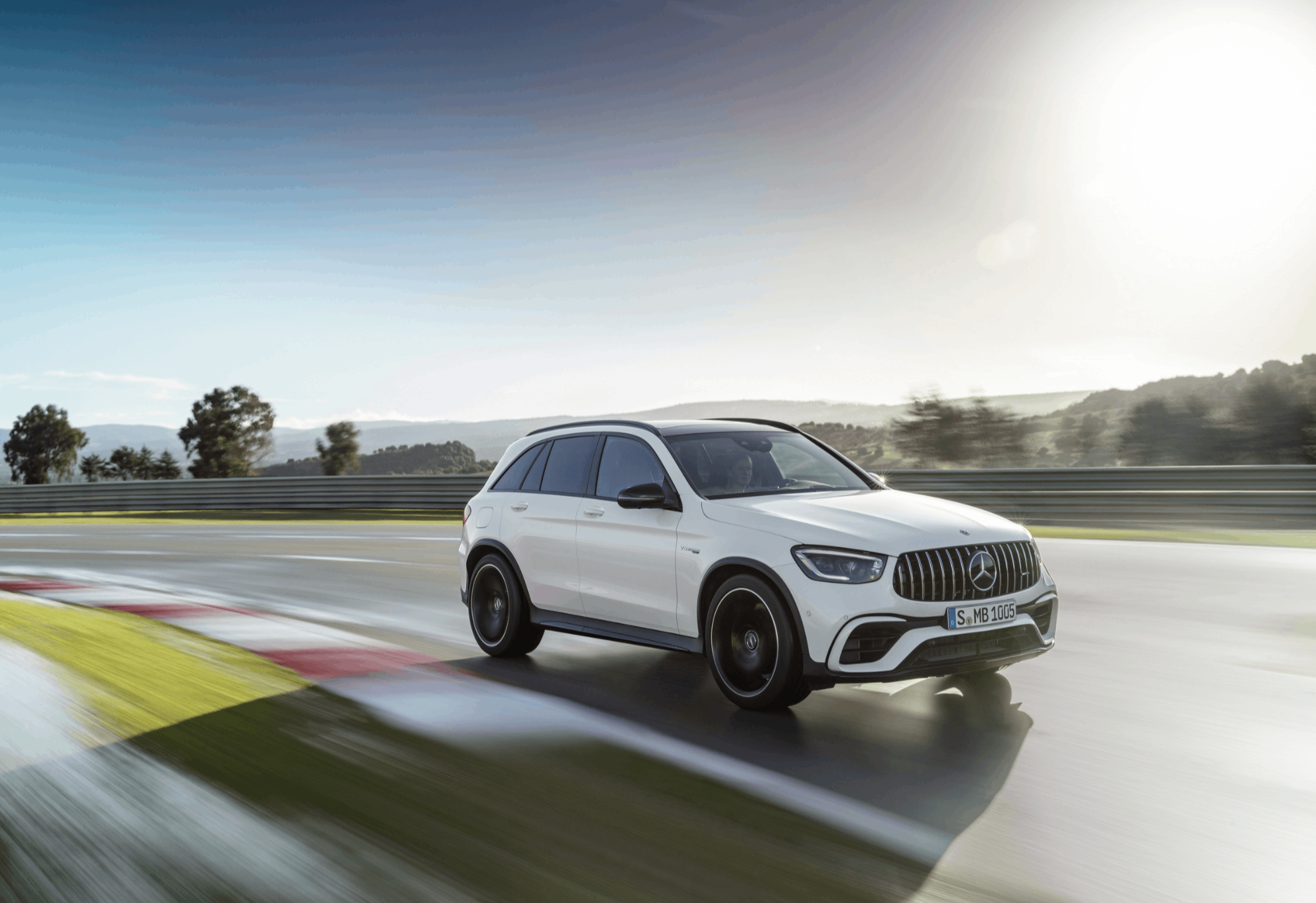 Mercedes AMG GLC driving on a road