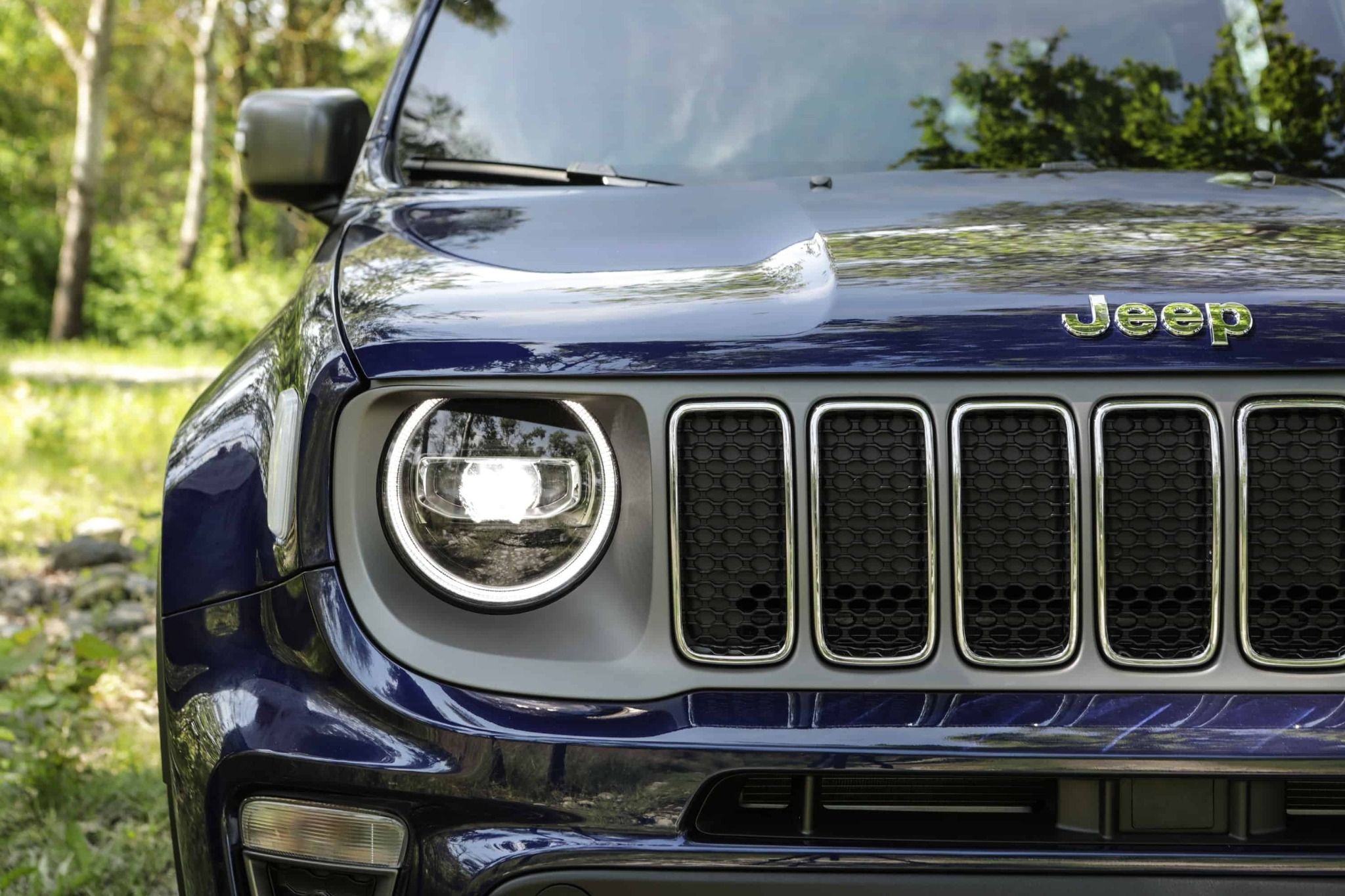 close up view of blue jeep renegade front