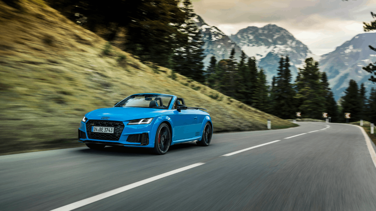 Blue Audi TT Roadster Driving Through the Valley