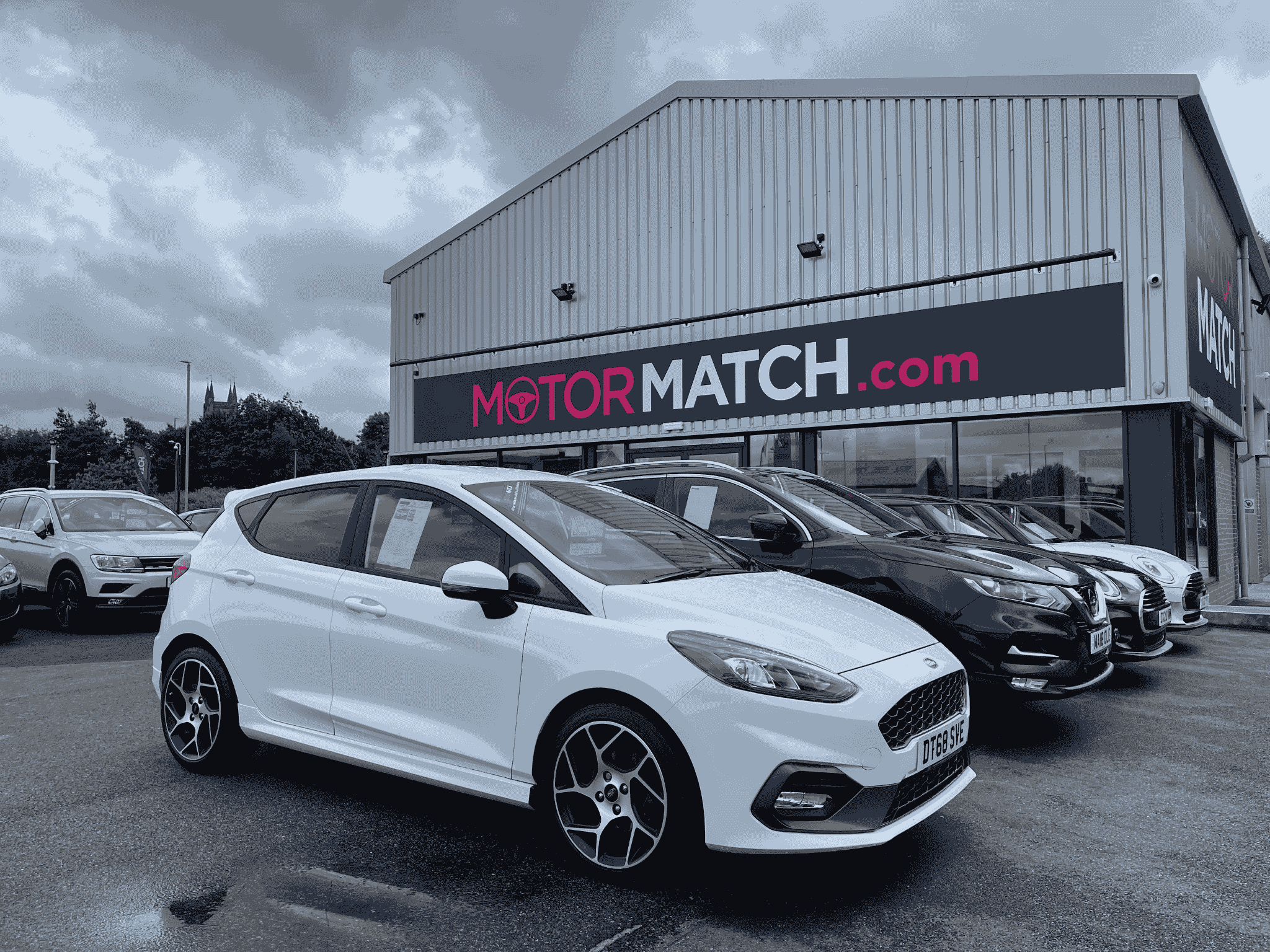 White car outside motormatch garage