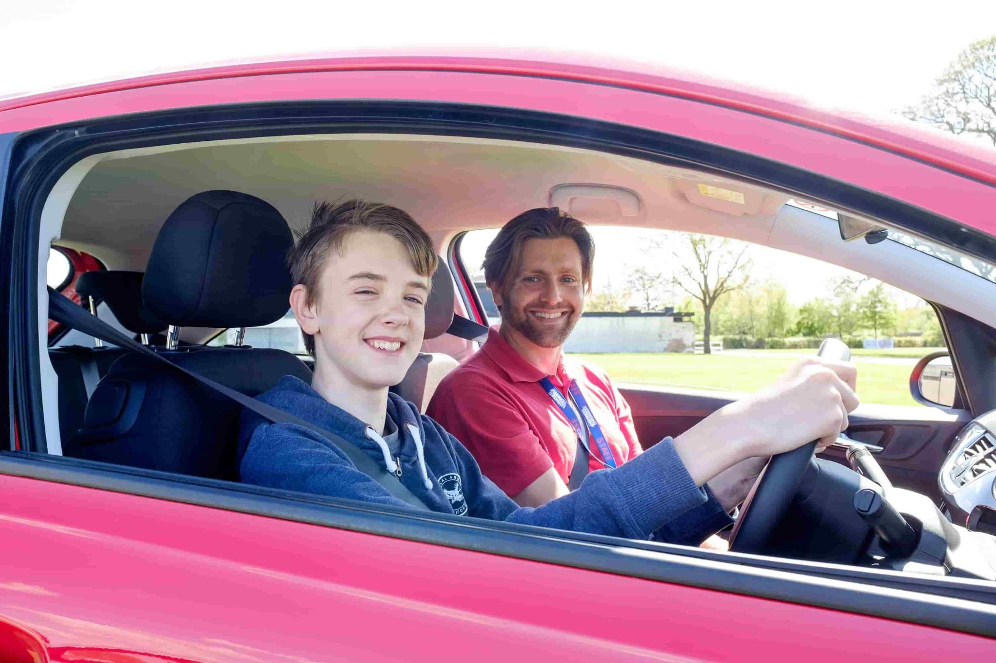 A youngster behind the wheel at a Young Driver lesson