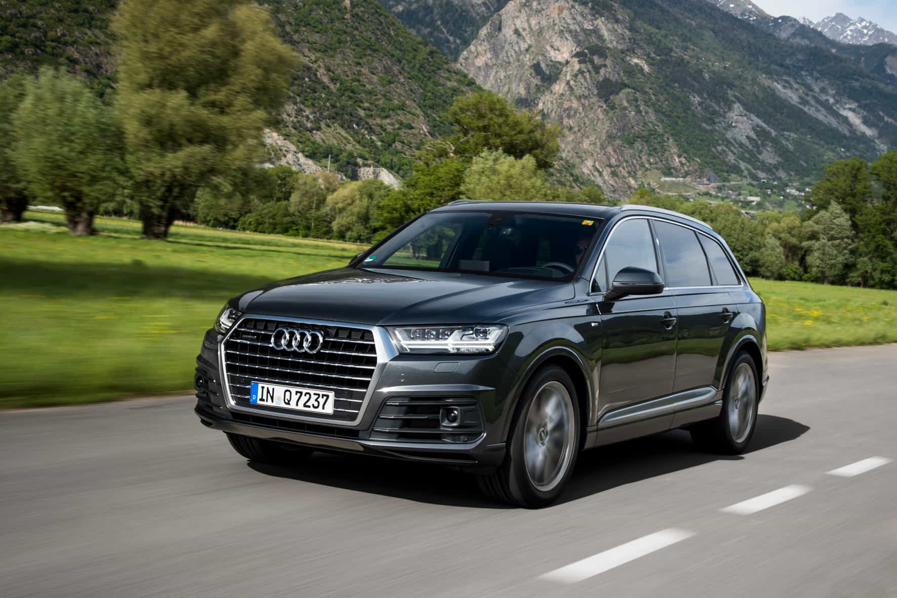 Grey Audi Q7 Driving through the Country Side
