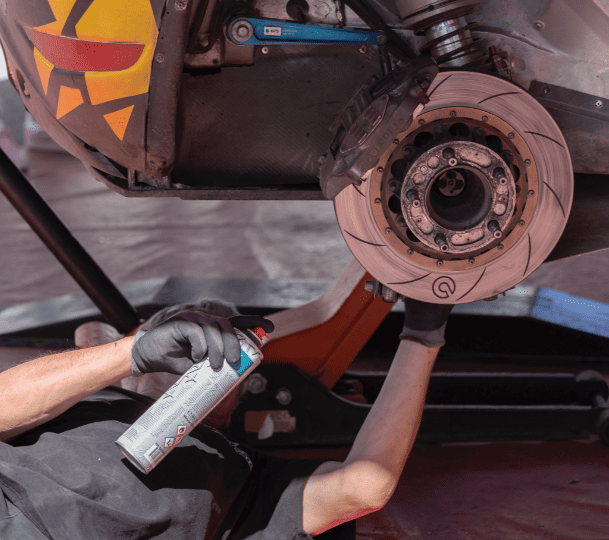 Technician  working on brake