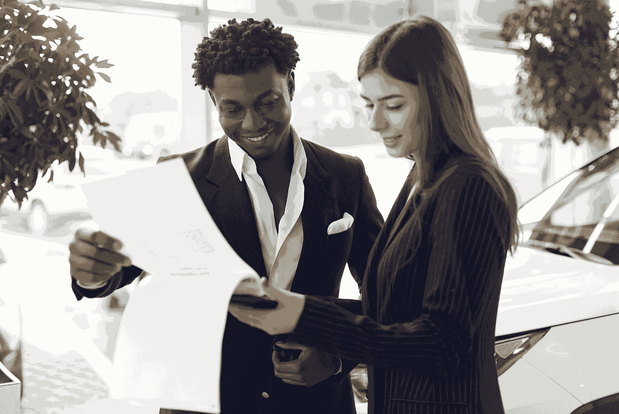 business man and women looking at paper work
