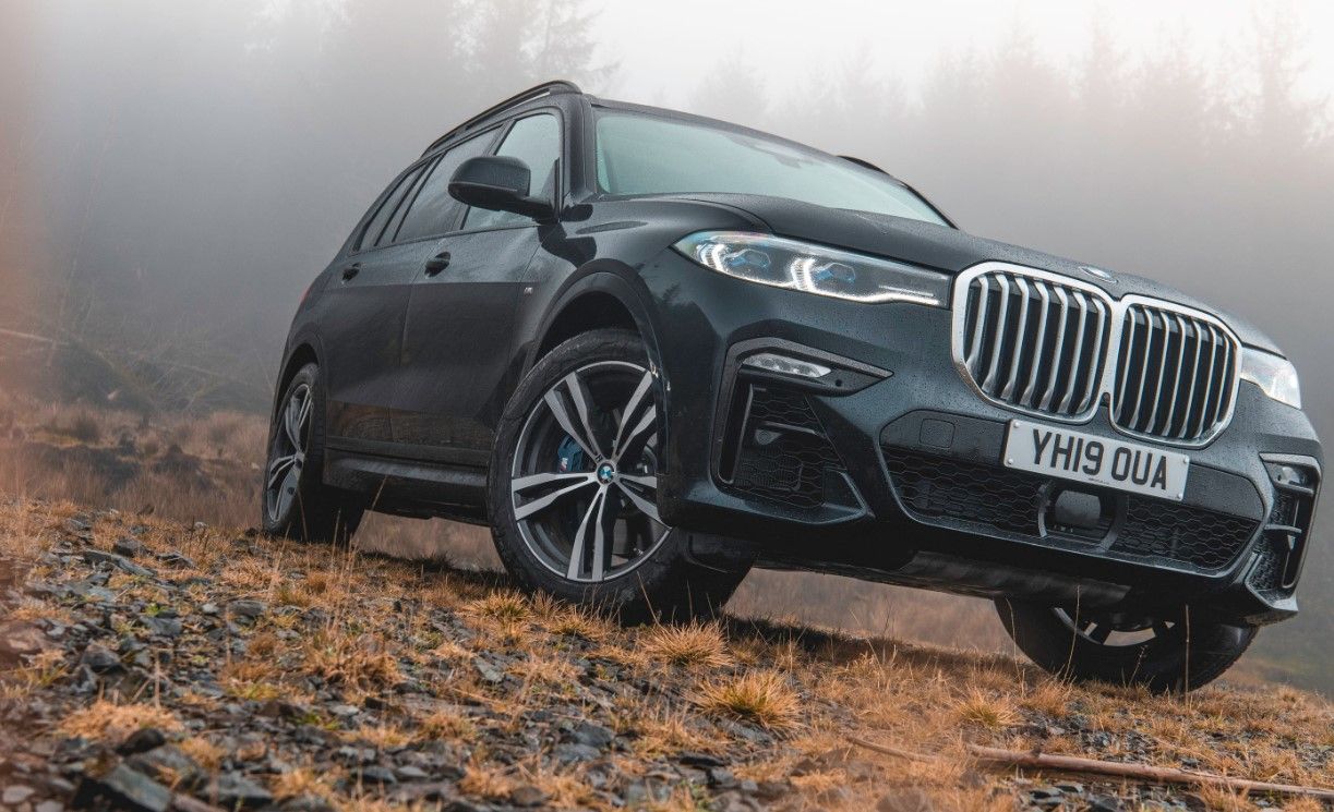 Close up of a BMW X7 with a foggy background