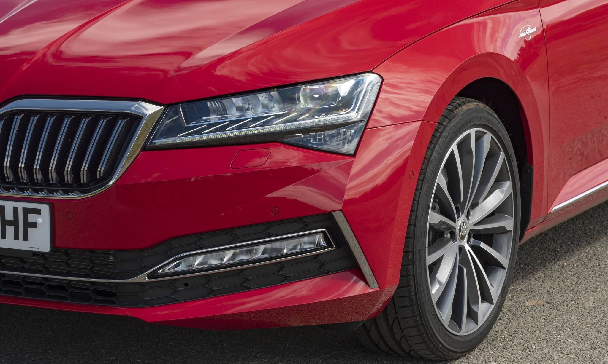 Red Skoda Superb Headlight
