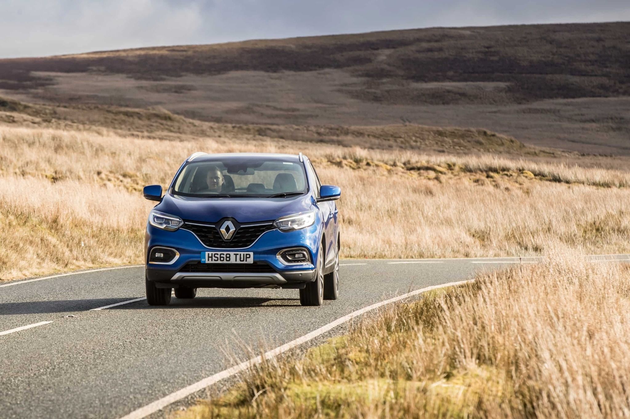 Front of Renault Kajar Driving Down the Road