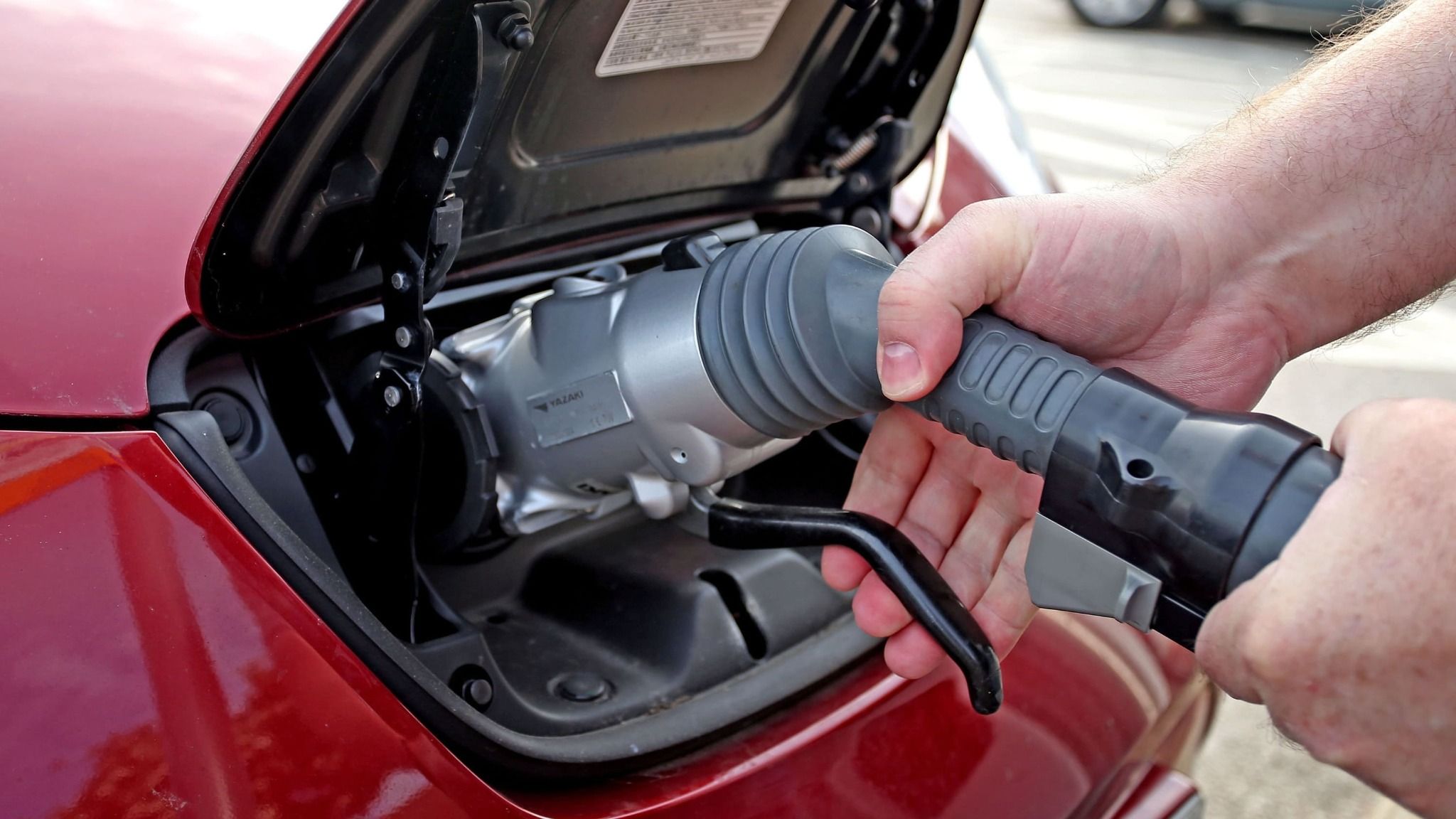 Electric car being charged