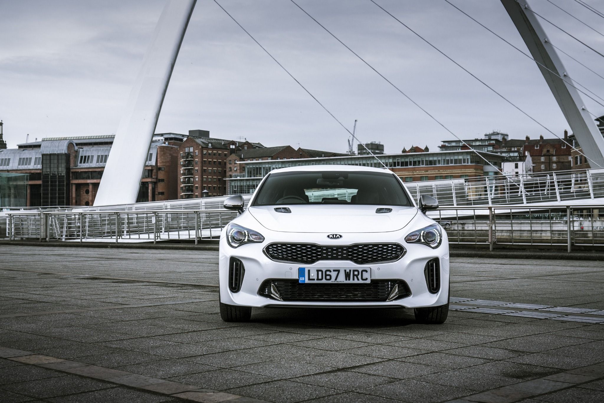 front view of a white Kia Stringer GT Line