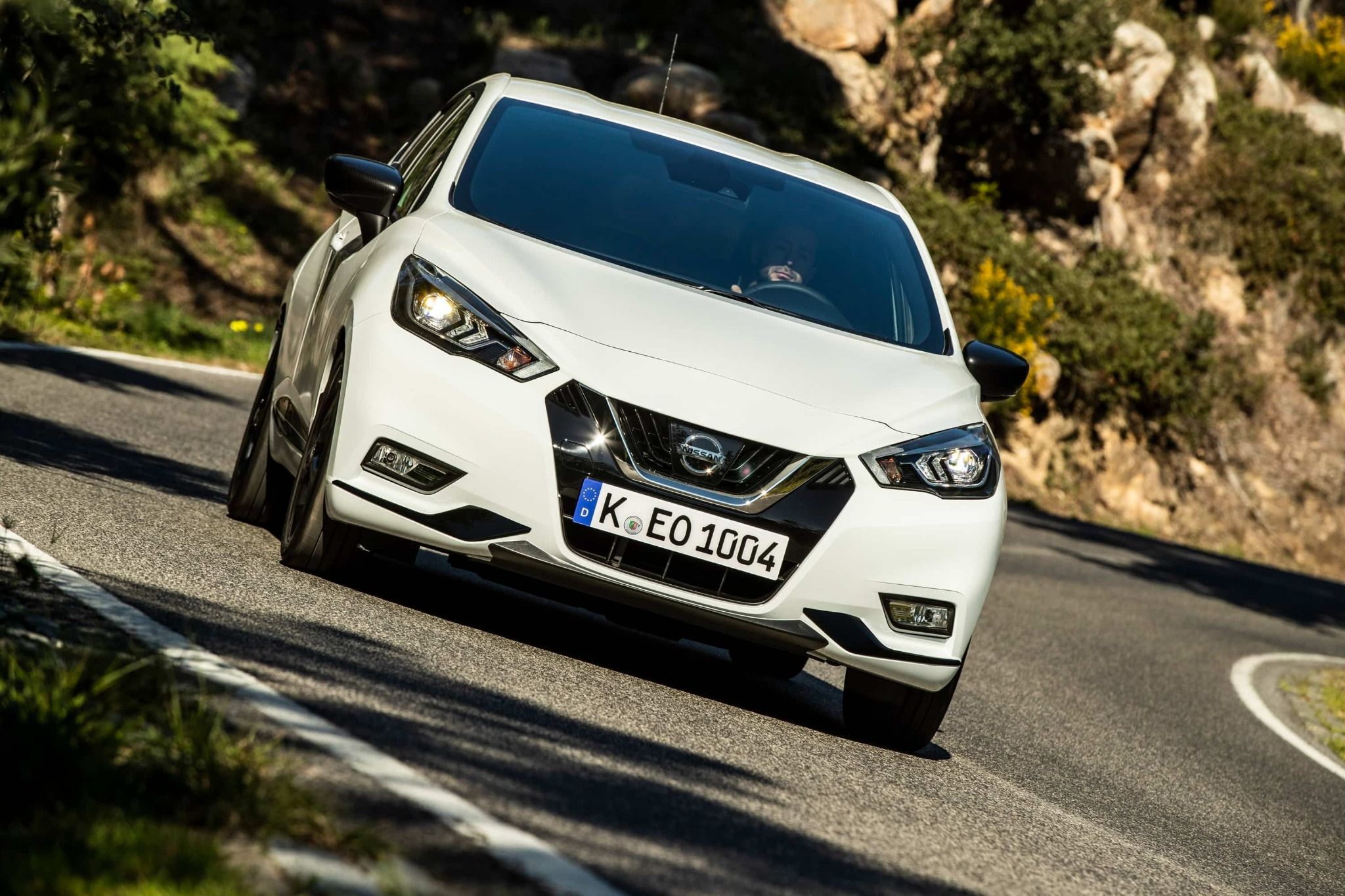 Front view of white Nissan Micra