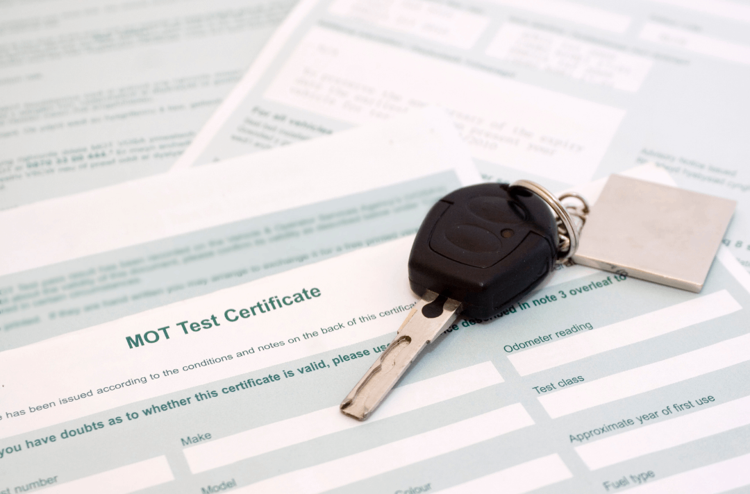 Car keys placed on paperwork