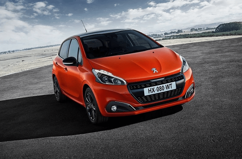 Orange Peugeot 208 parked