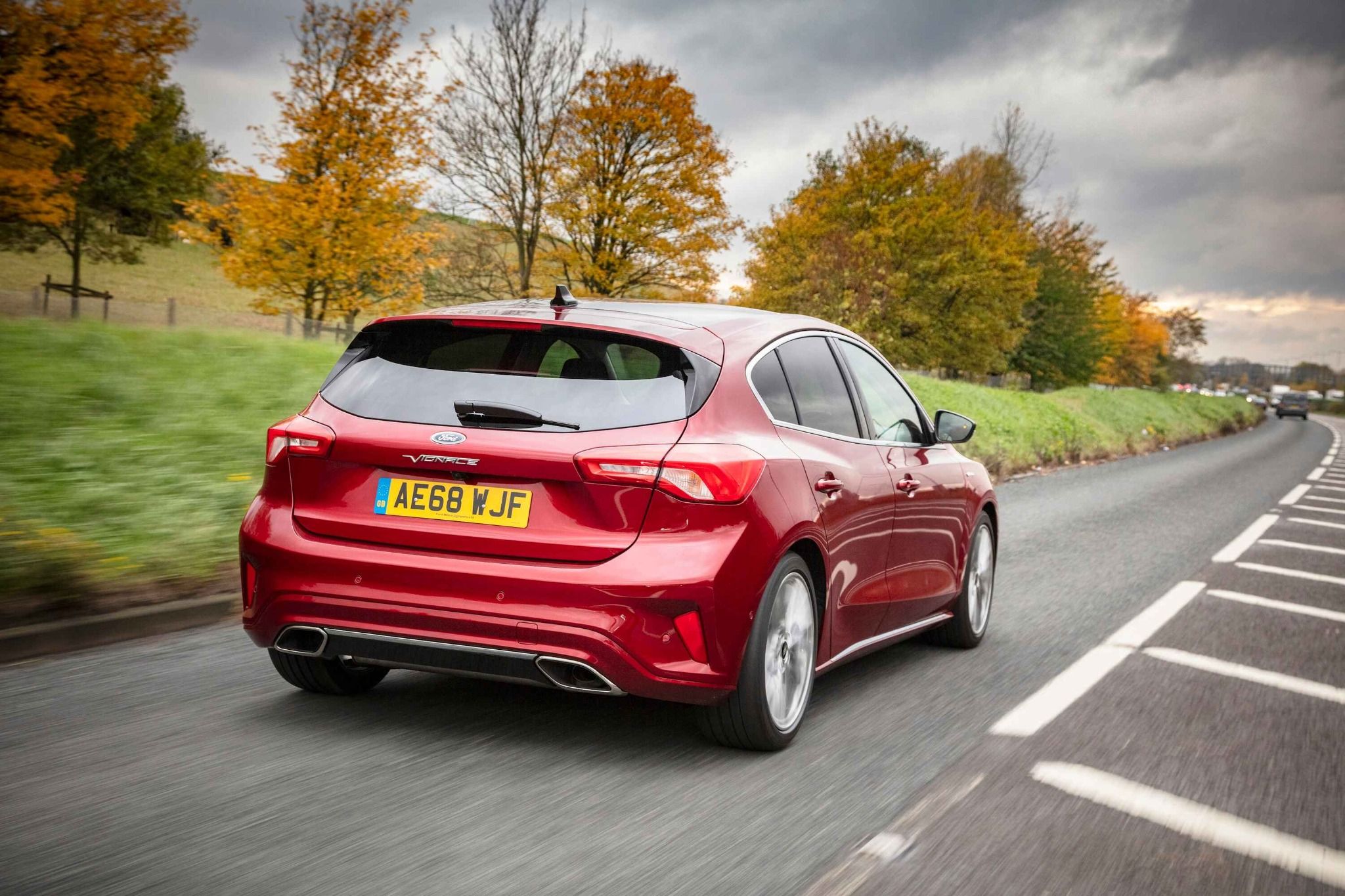 Rear view of red Ford Focus Vignale