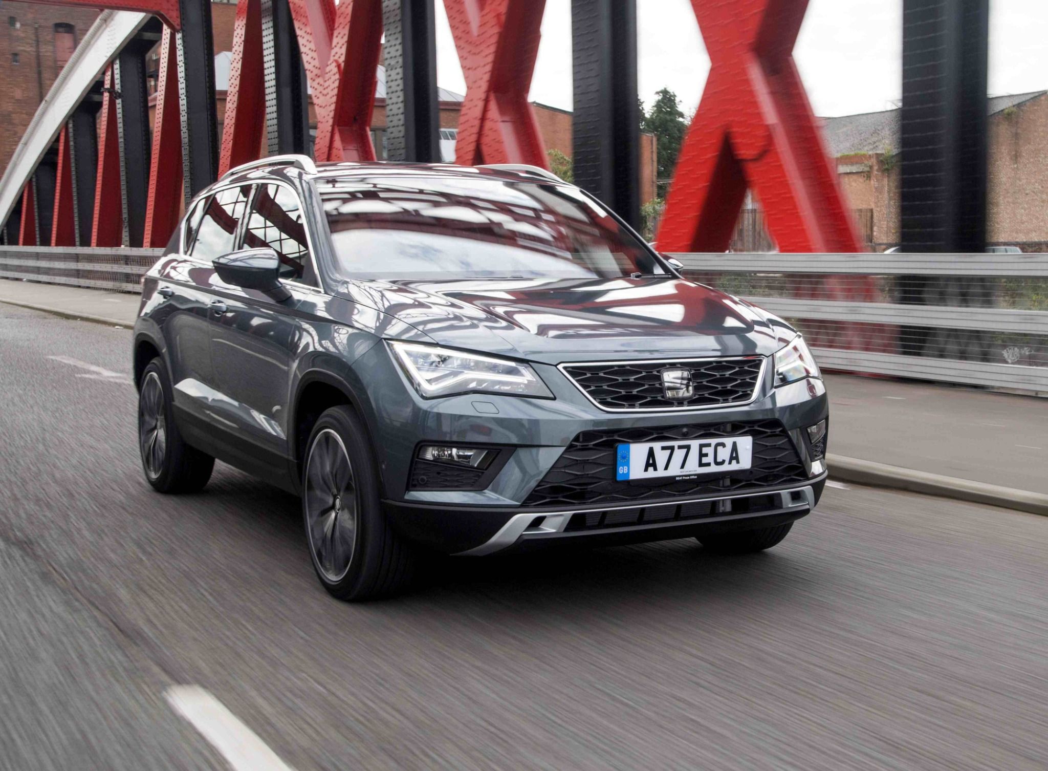 The SEAT Ateca driving across a bridge