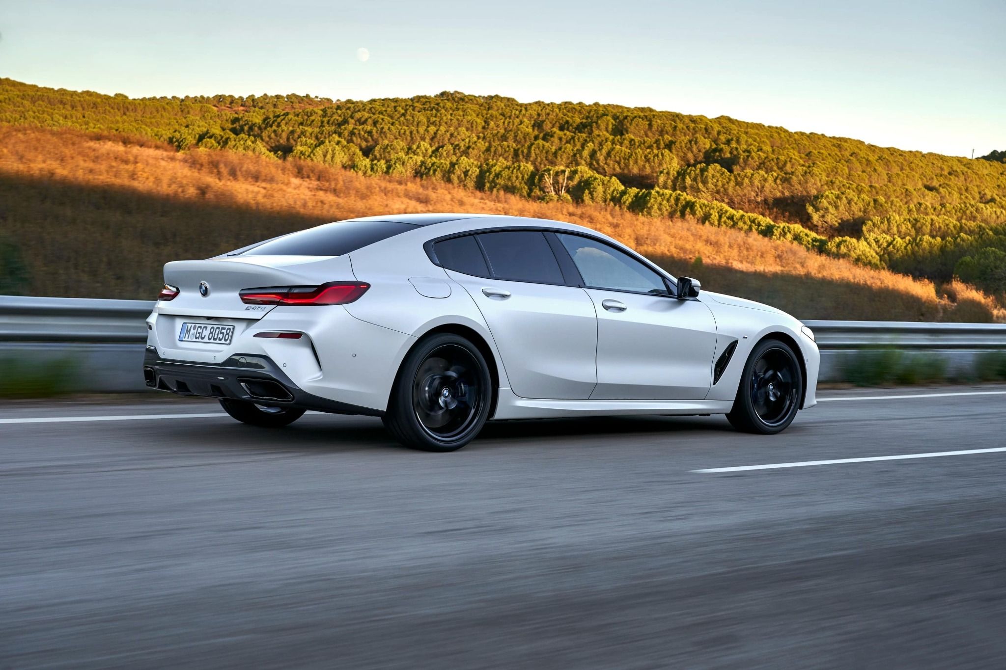 White BMW 8 Series from the Side