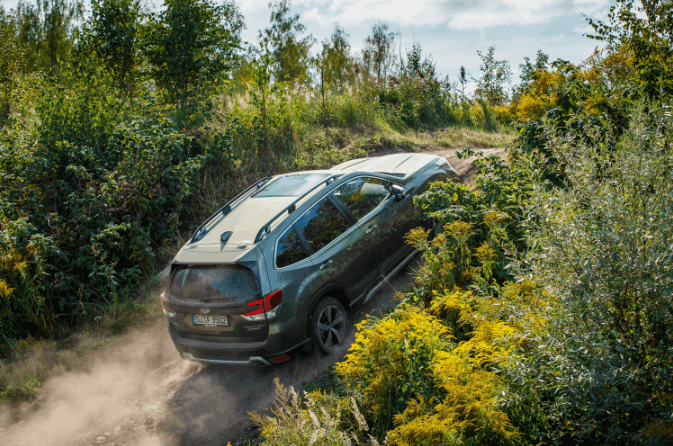 Subaru Driving up Steep Hill