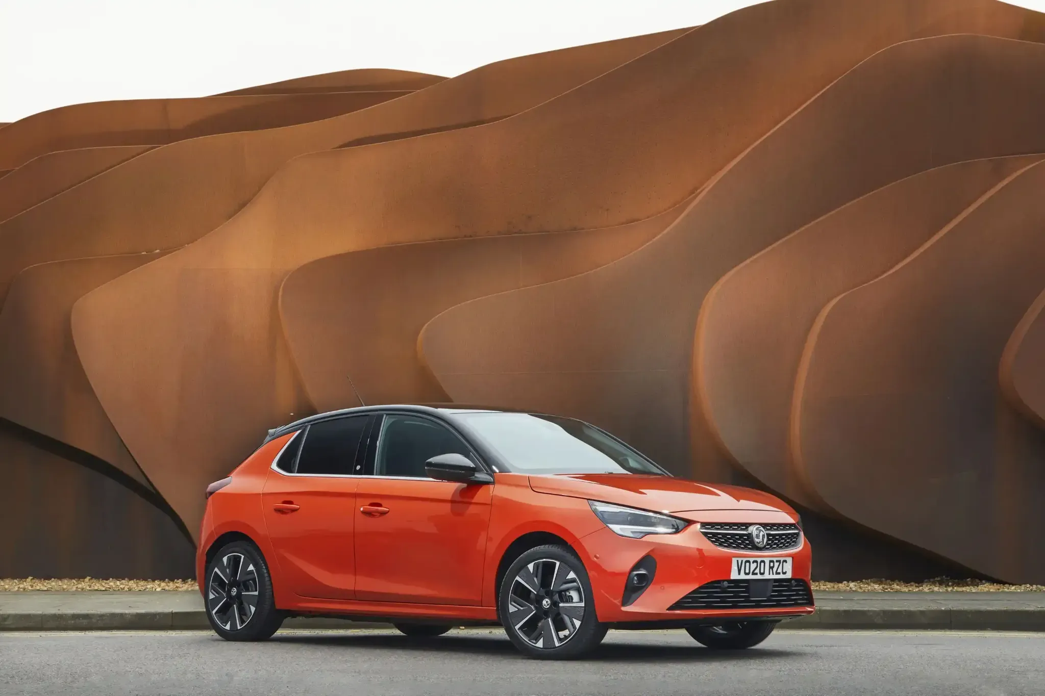 Vauxhall Corsa Parked in Front of Modern