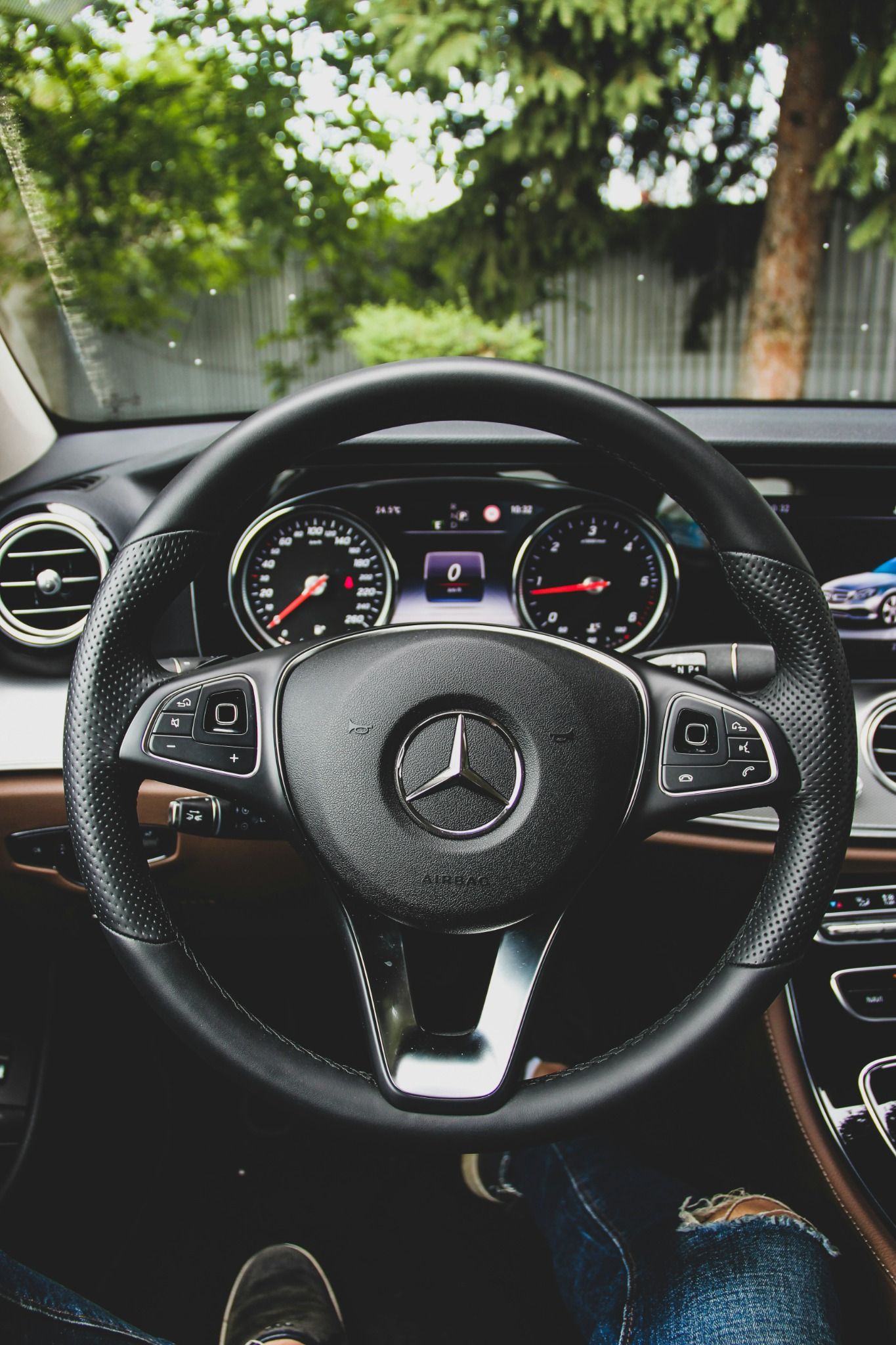 Close up of Mercedes-Benz steering wheel and dash