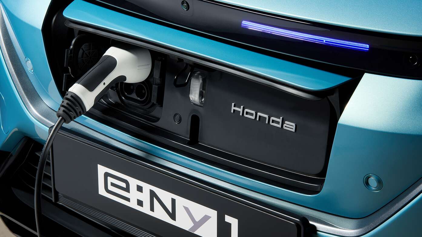 Close-up of a Honda e:Ny1 being charged.