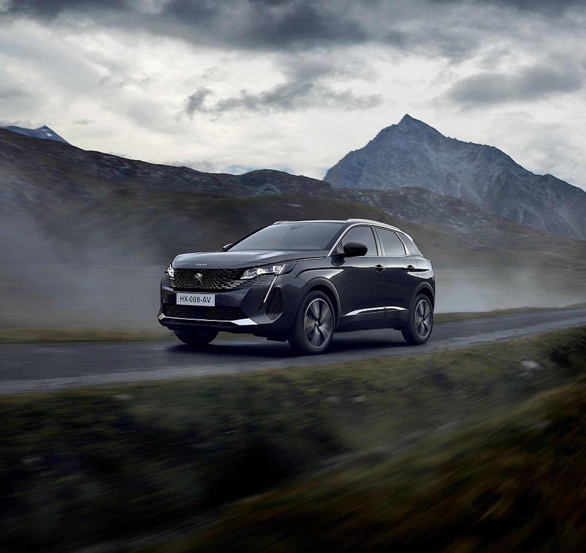 Peugeot 5008 driving a country road