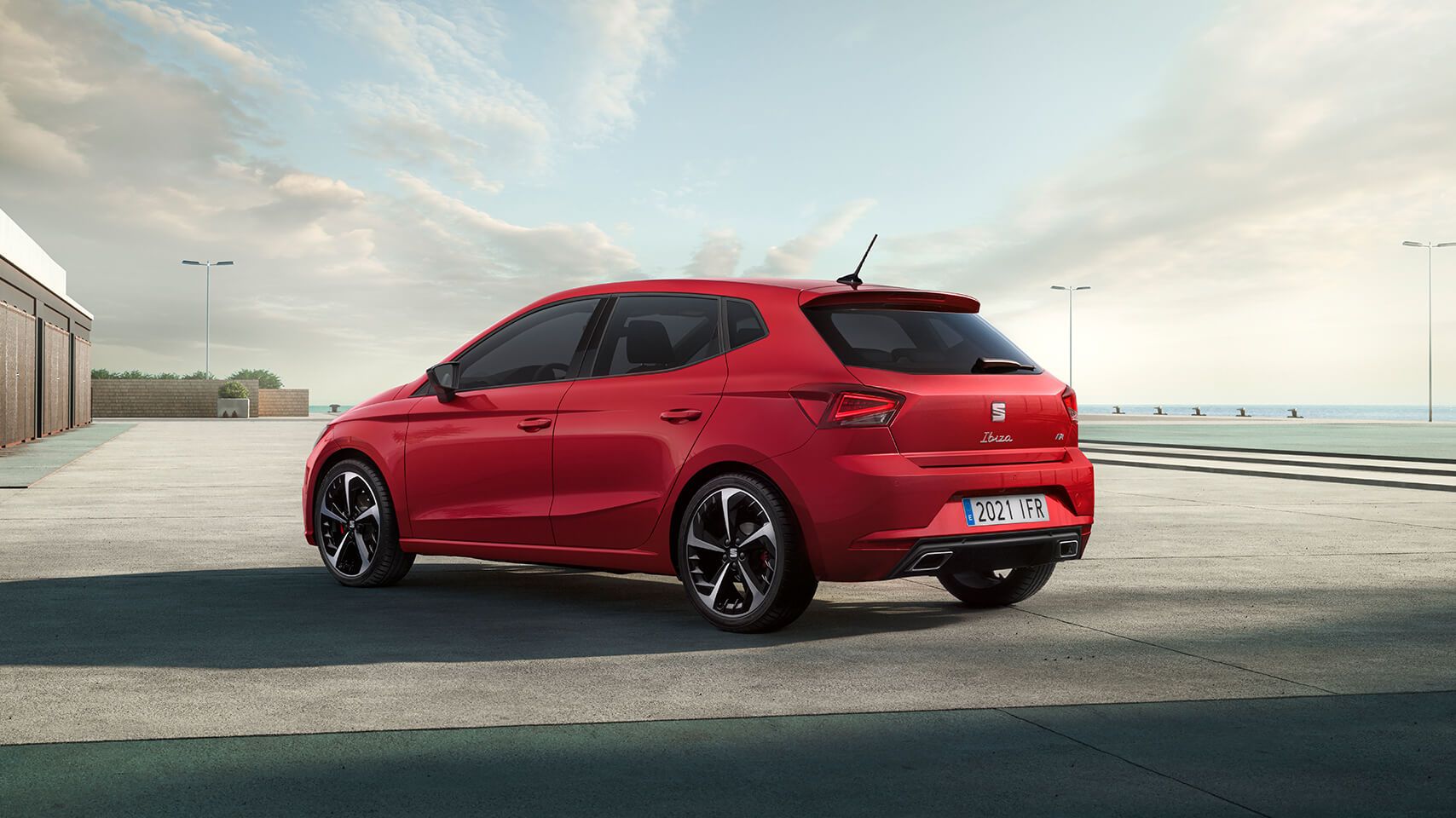 Red SEAT Ibiza exterior rear parked