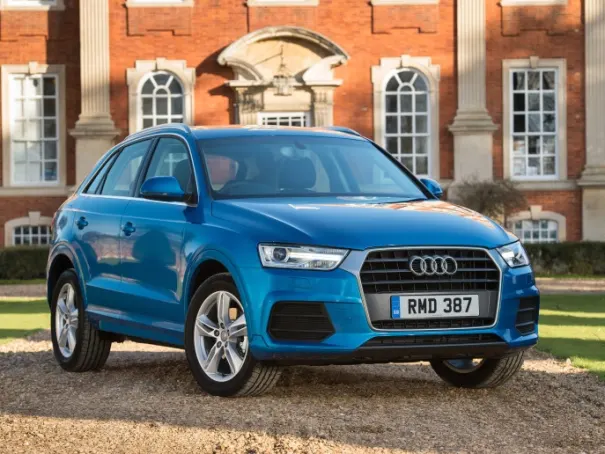exterior front side angled image of a blue Audi q3