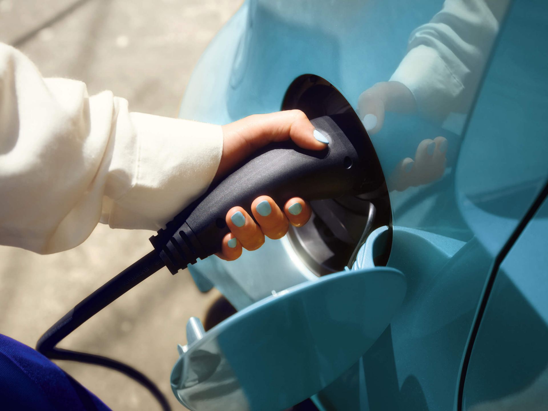 Close up of VW e-up charging cable and charging port