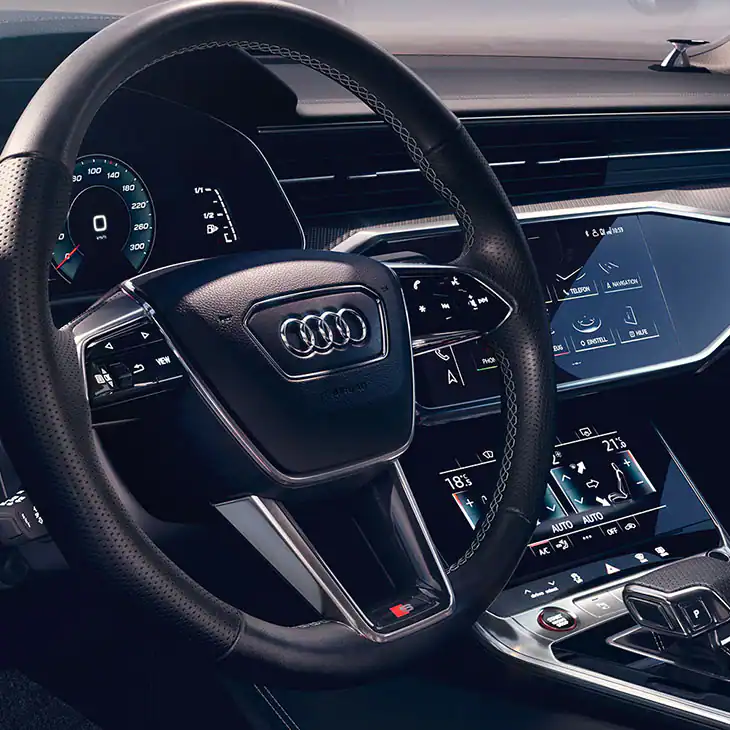 close up of an audi s6 avant steering wheel