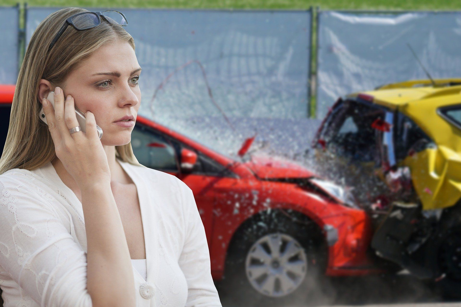 Women phoning for assistance after an accident
