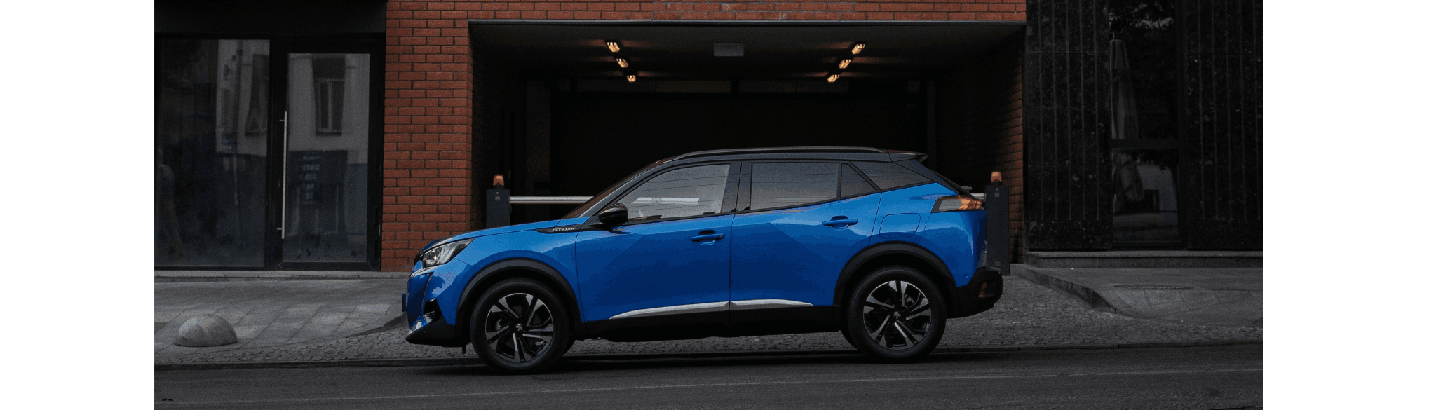 Blue Peugeot From The Side