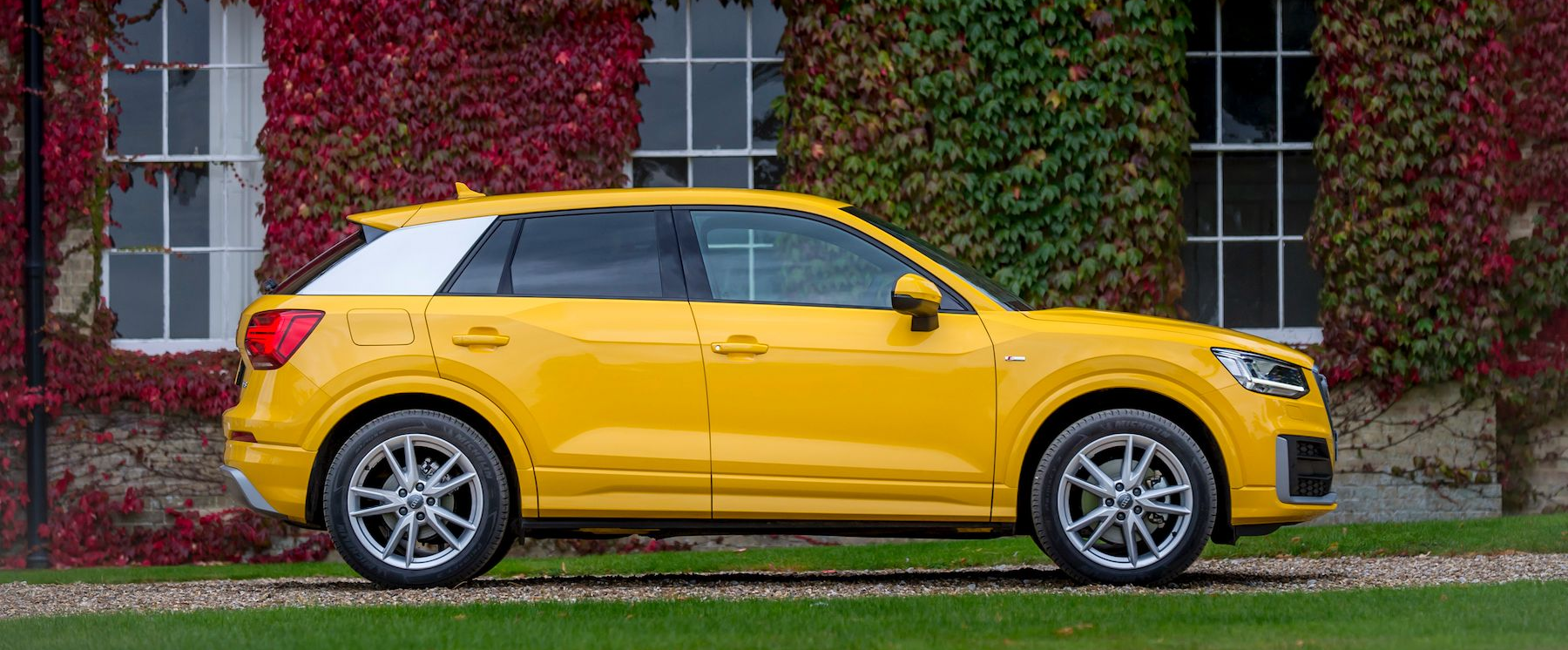Yellow Audi Q2 Side image
