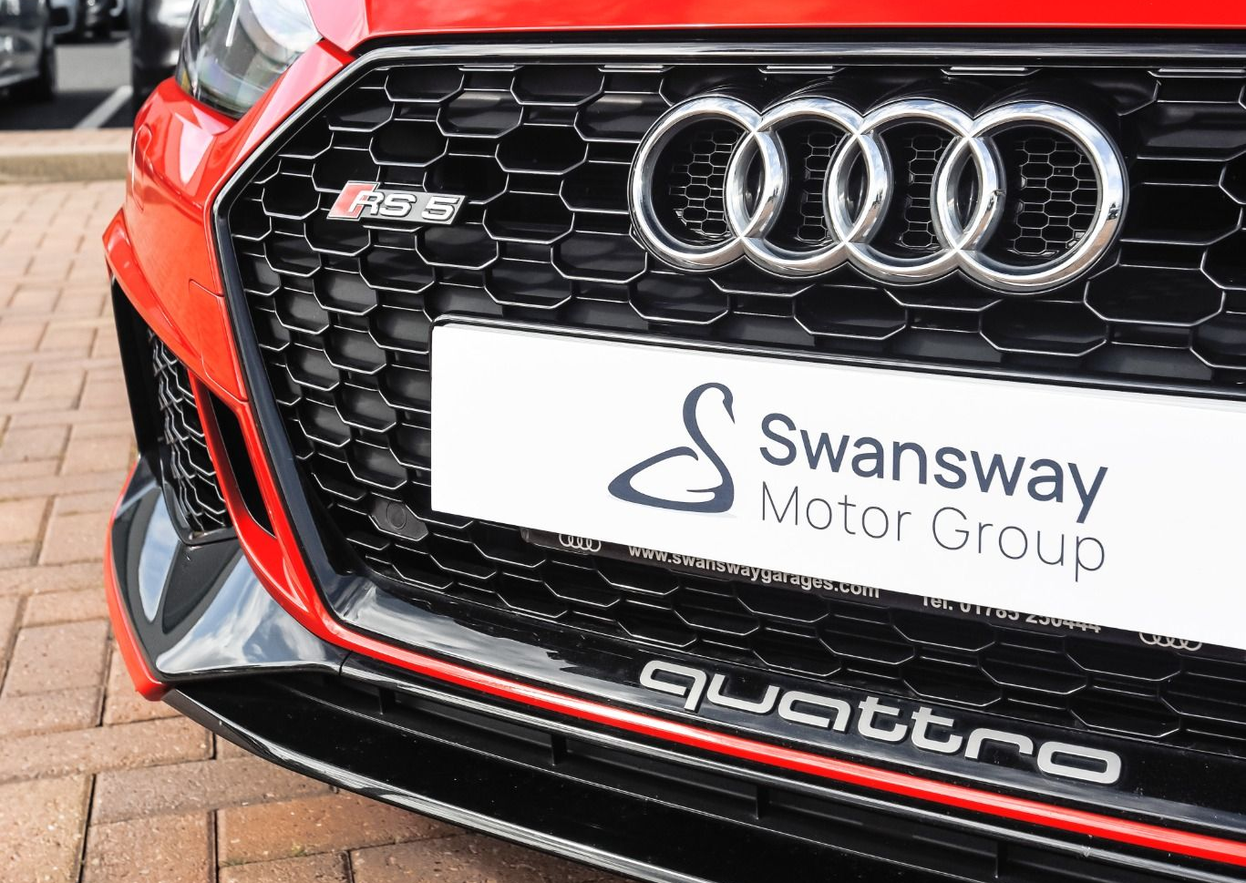 Front grille of a Red Audi RS5