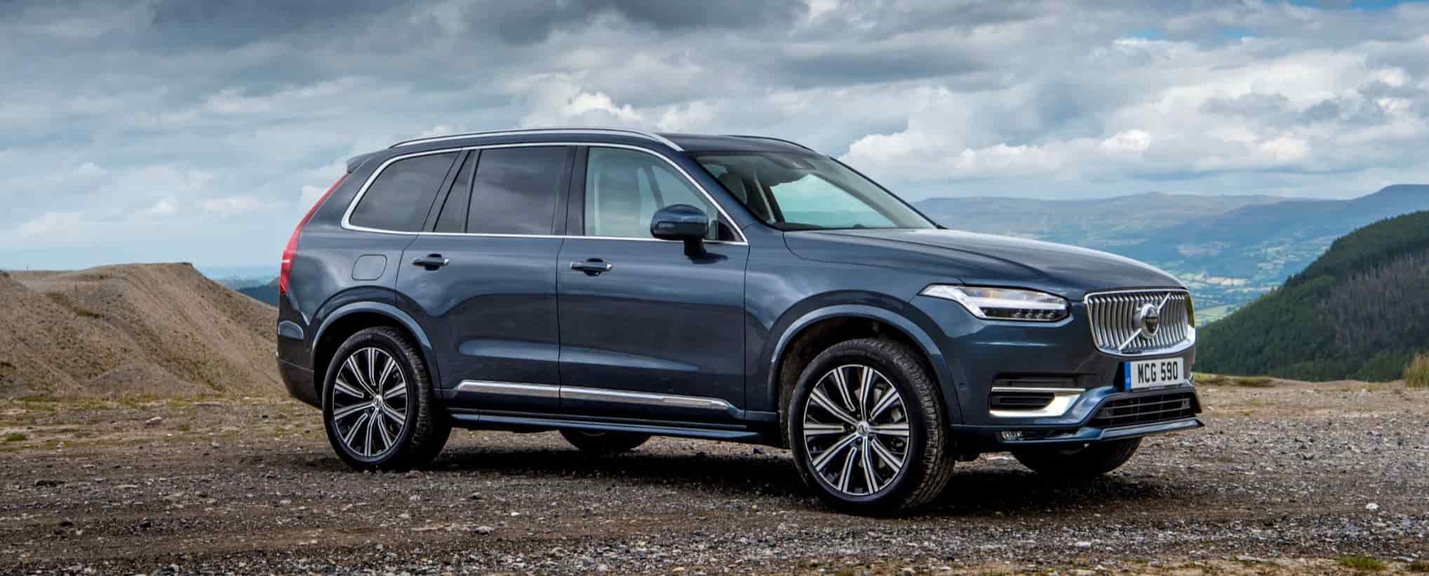 Volvo XC 90 Parked In Front of Landscape