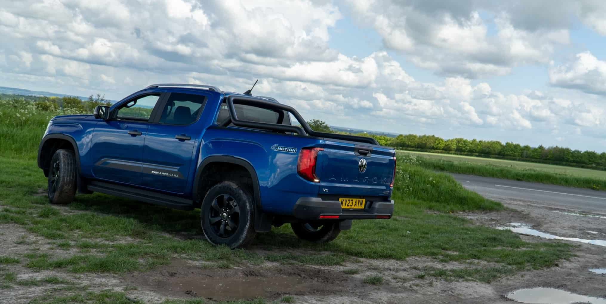 Rear view of blue amarok off-roading