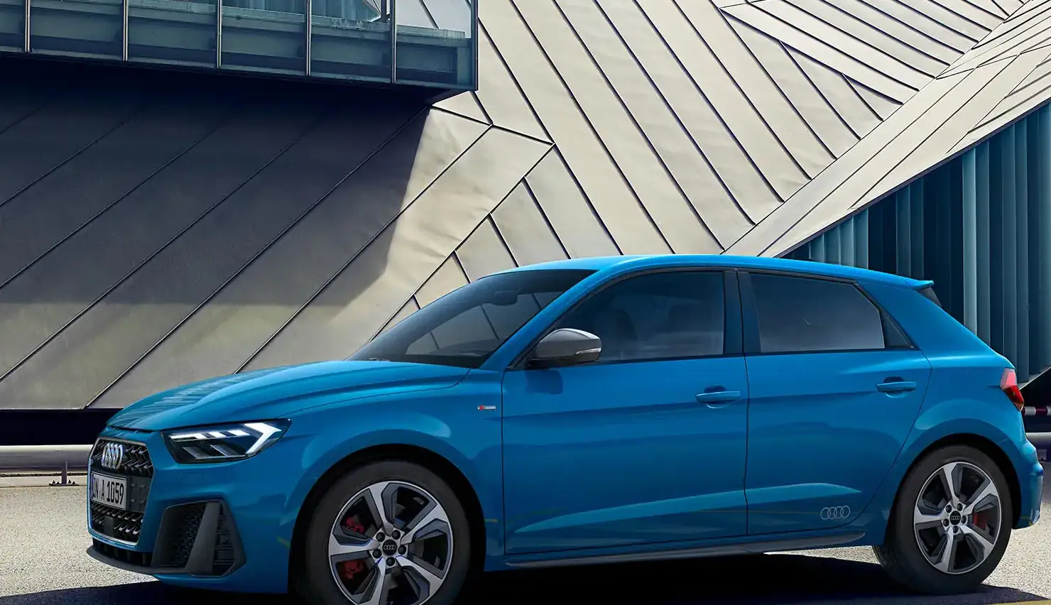 Blue audi a1 sportback side view