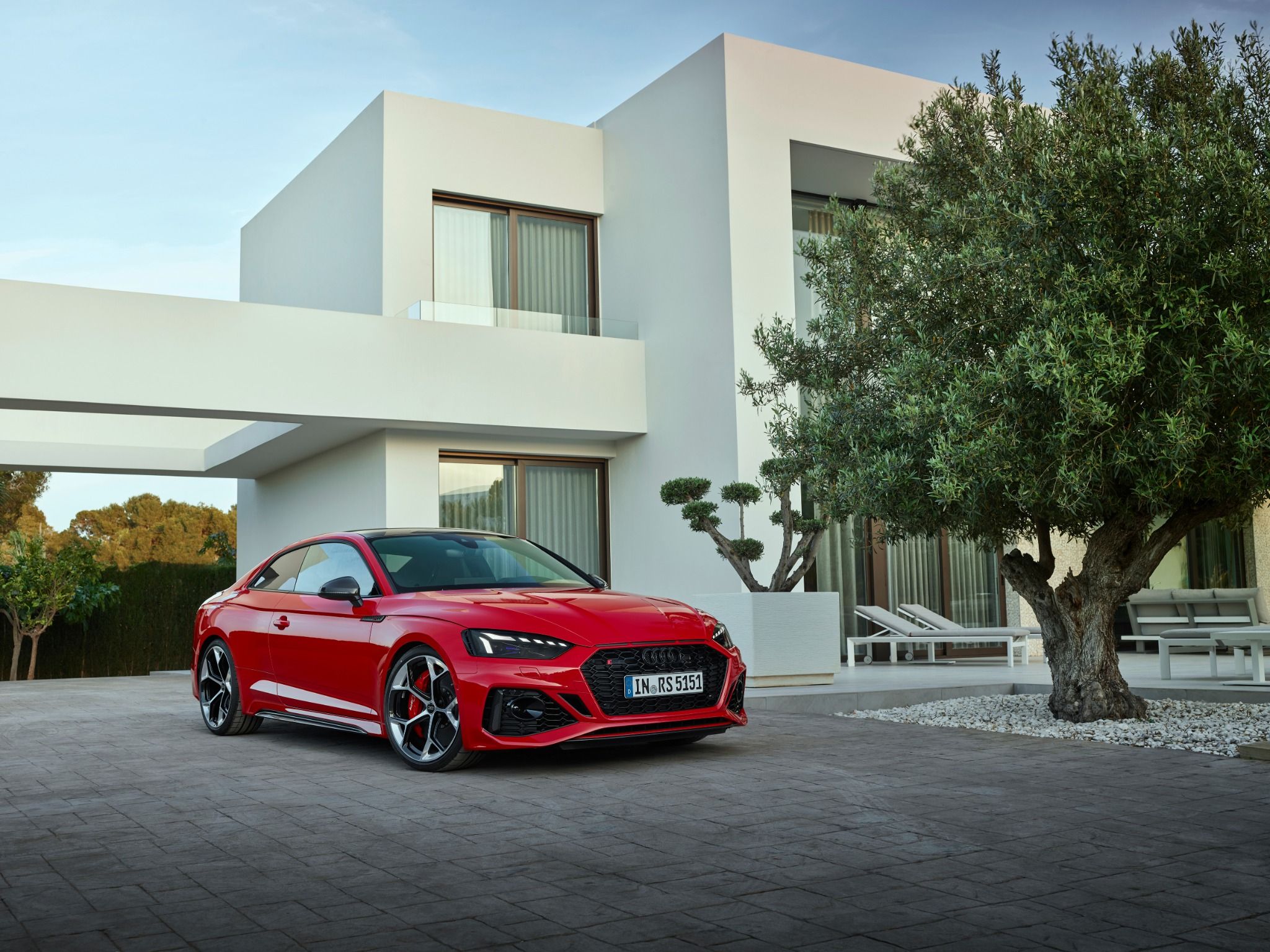 Audi RS5 Coupe parked in front of a building