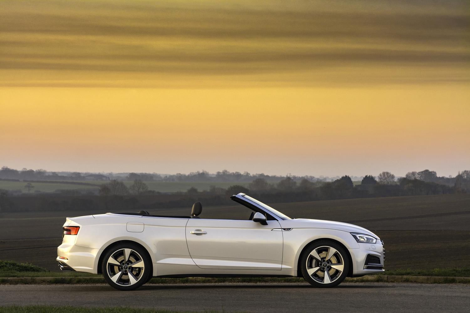 White Audi A5 cabriolet side