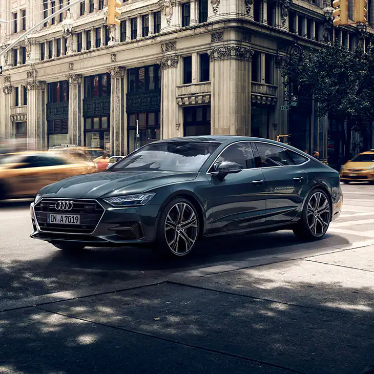 Audi A7 Sportback front exterior driving down the road