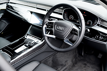 Audi A8 black interior driver side view