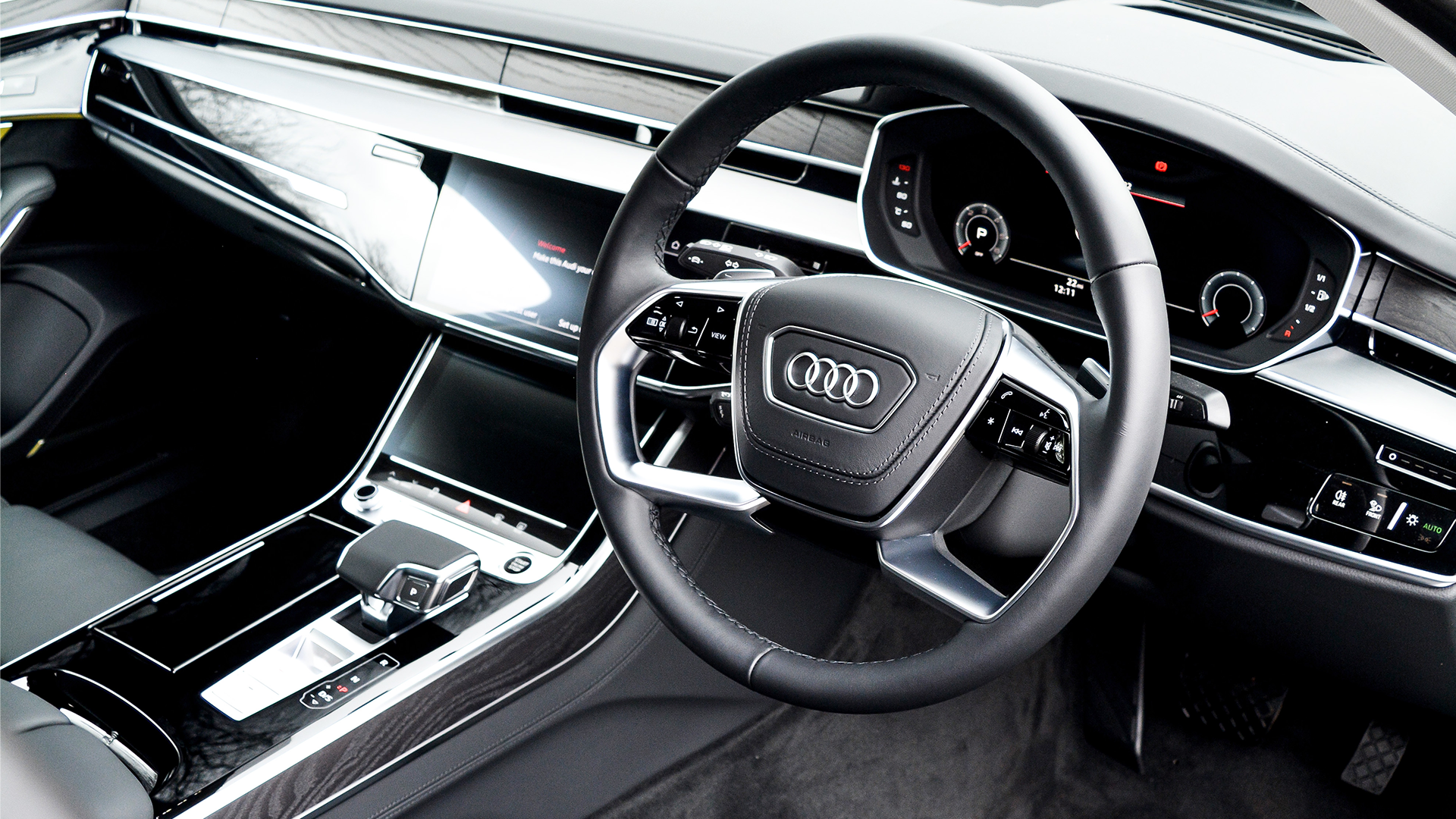 Audi A8 black interior driver side view