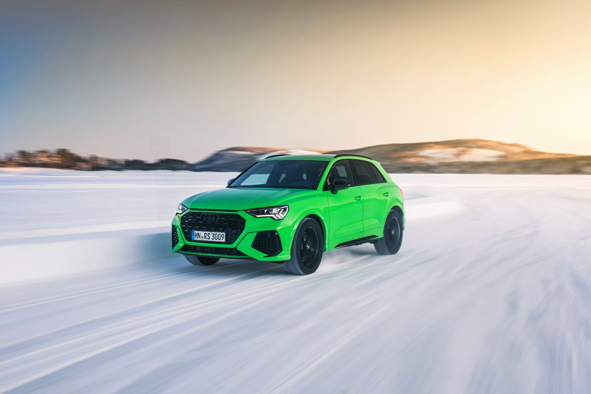 Audi RSQ3 driving on a snowy road