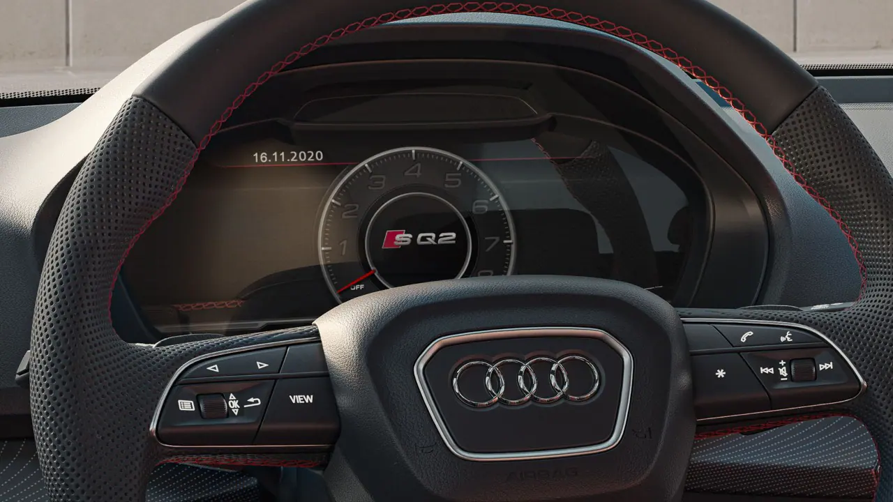 close up of audi sq2 digital cockpit and Steering Wheel