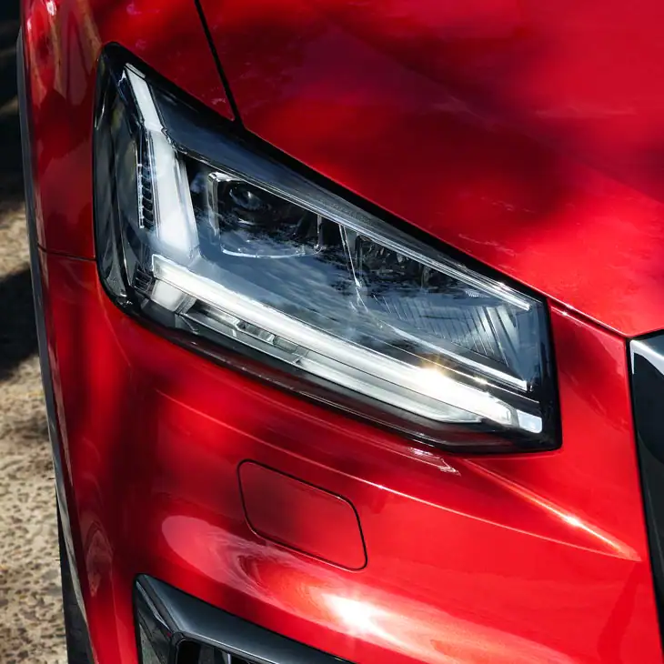 close up of  a red Audi sq2 led headlight