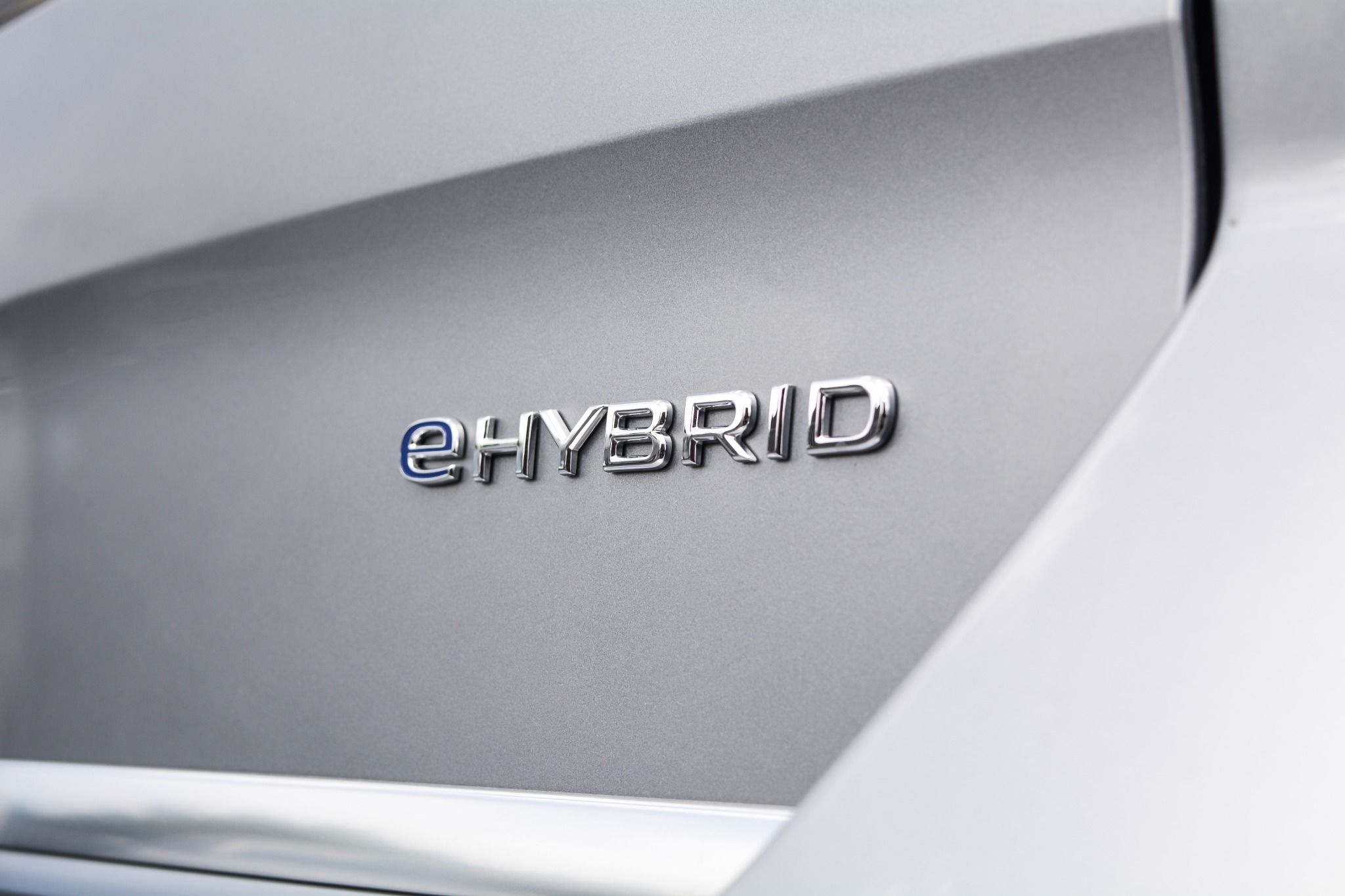 Close up of Audi e-hybrid badge