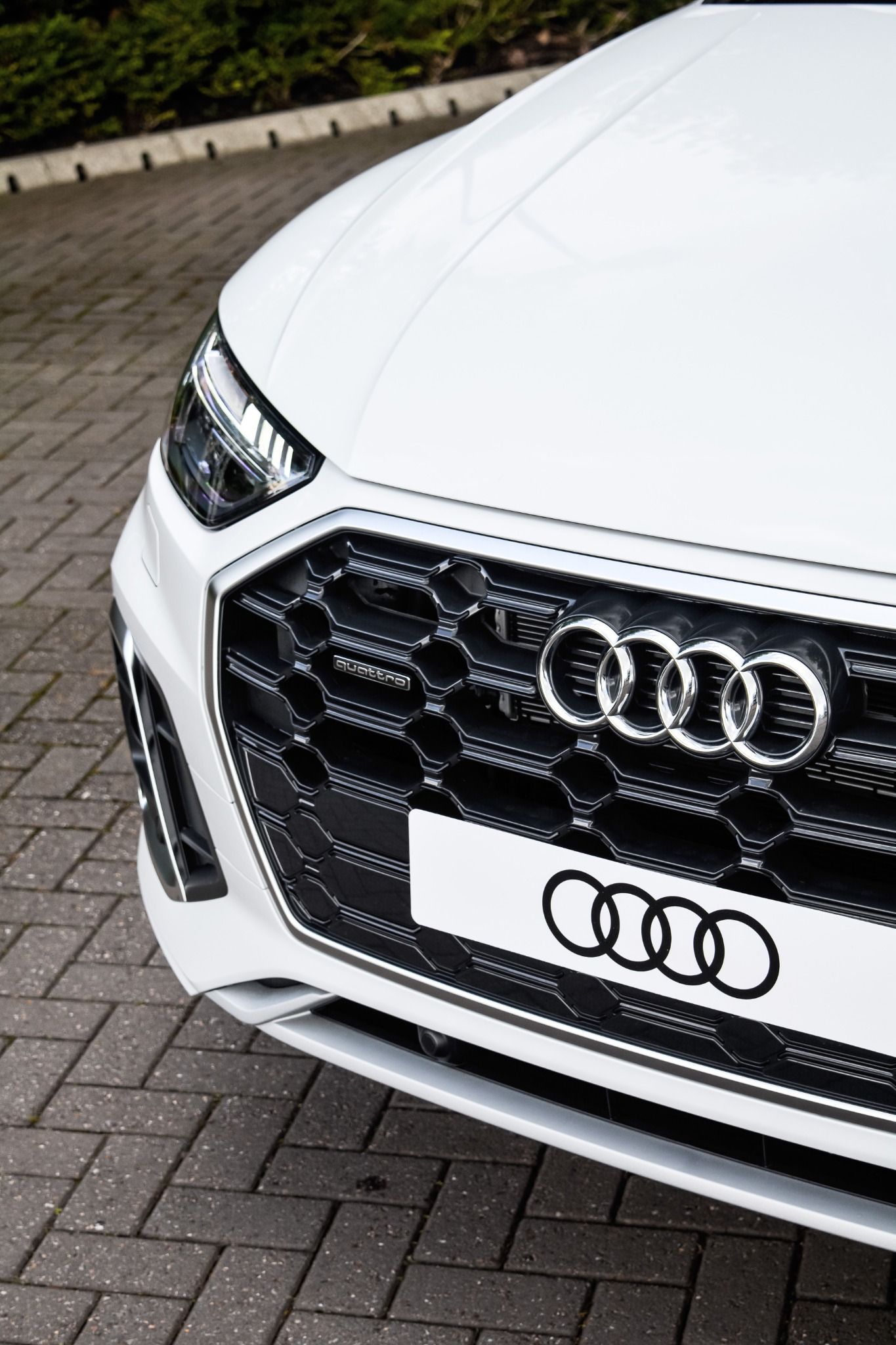 close-up of the front of an Audi Q5 in white