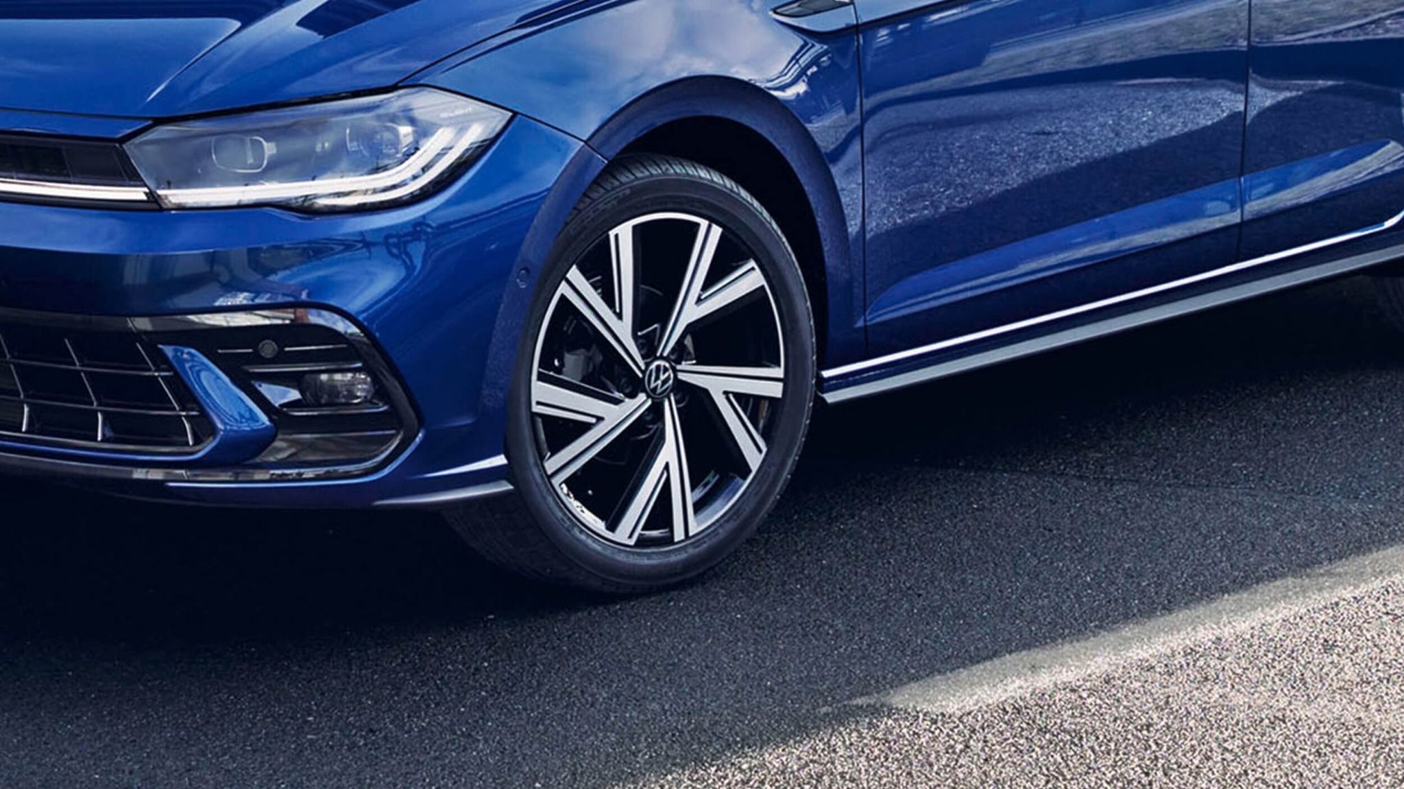 close up of  blue VW polo alloy wheels