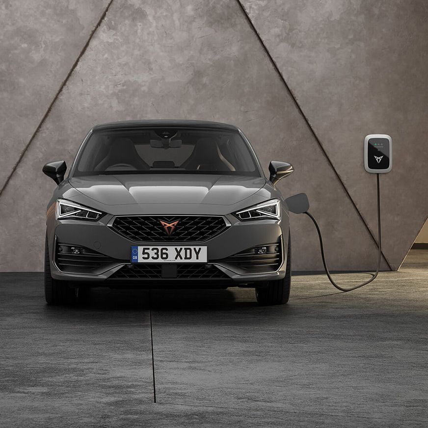 Grey Cupra lLeon e hybrid charging up