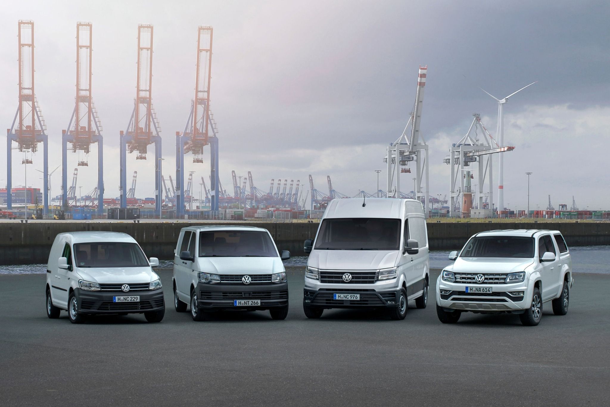 Four different sizes and styles of   VW White Vans